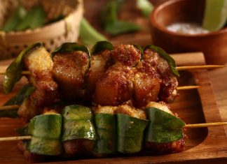 Thưởng thức hương vị núi rừng với món thịt lợn nướng lá móc mật